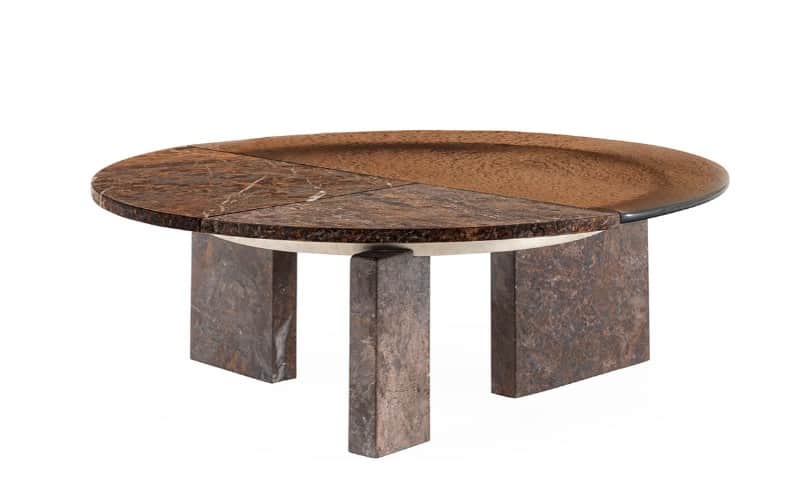 A low-profile round coffee table featuring a segmented tabletop composed of brown marble and a trans… — 3D model