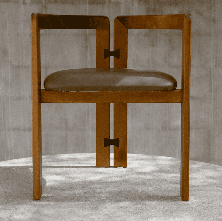 A wooden chair with a cushioned seat and a distinct 'butterfly' joint connecting the vertical suppor… — free FBX 3D model