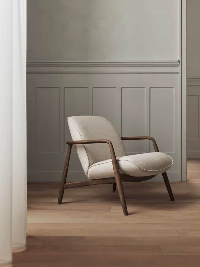 A contemporary lounge chair featuring a curved, off-white upholstered seat and backrest, supported b… — free GLB 3D model