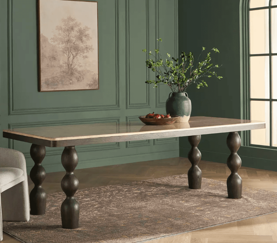 A rectangular dining table featuring a polished light-colored stone or composite top set within a da… — 3D model