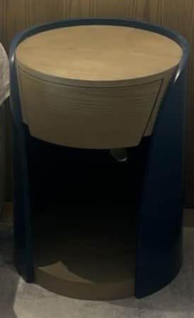 A cylindrical nightstand with a rounded top surface and a single drawer. The exterior is a deep blue… — free FBX 3D model