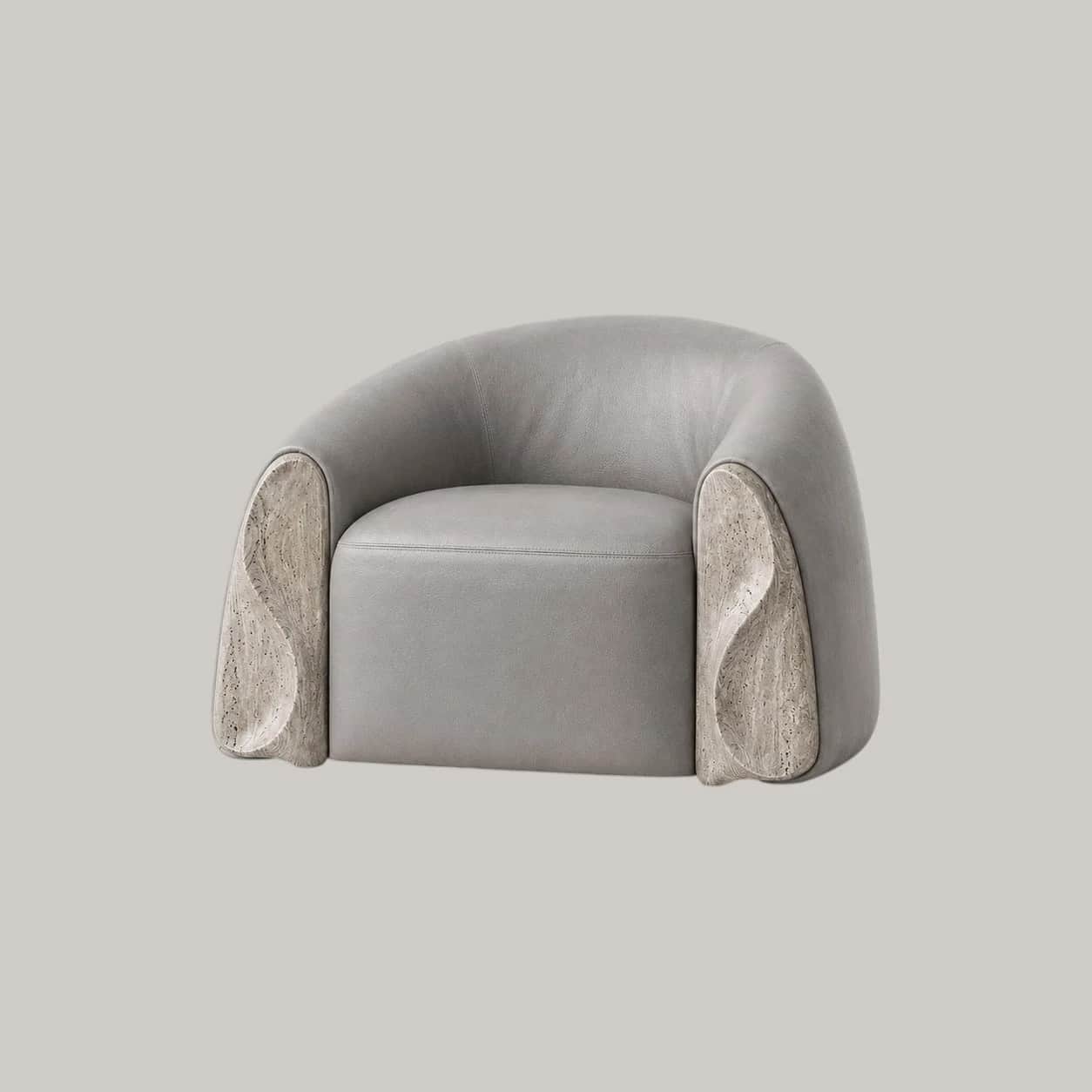 A contemporary barrel-shaped lounge chair featuring light grey upholstery and unique carved stone pa… — 3D model