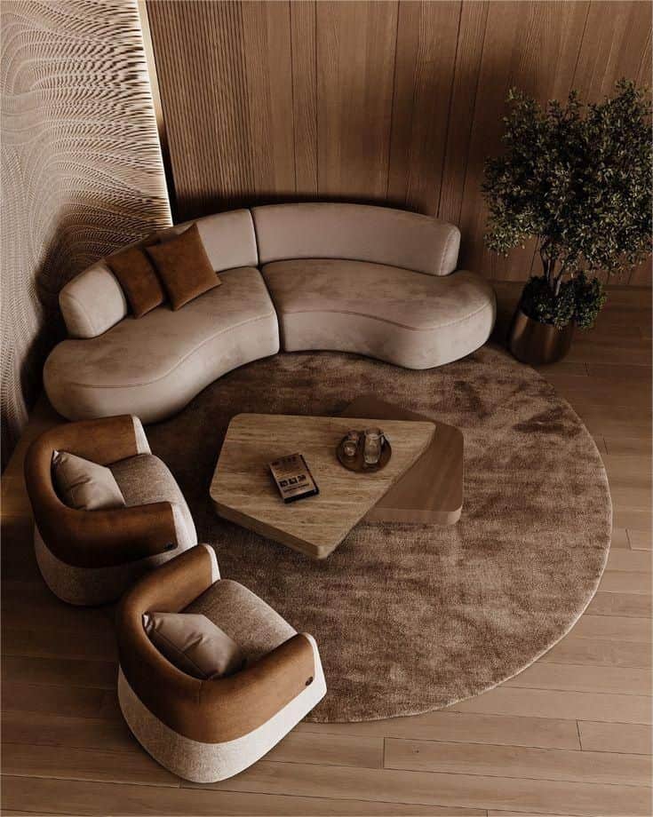 A curved, sectional sofa with a modern design. It features a soft, upholstered finish and appears to… — free SKP 3D model