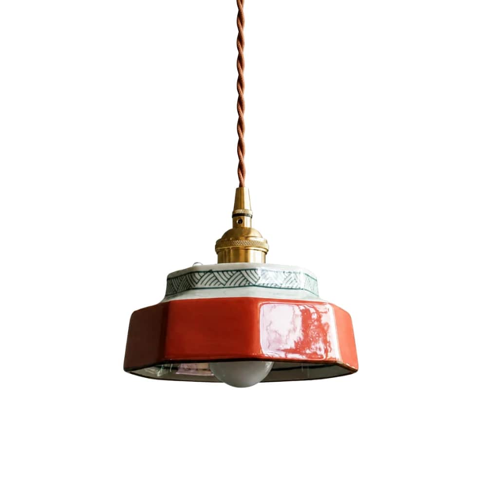 A decorative pendant light featuring an octagonal ceramic shade with a two-tone design. The lower se… — 3D model