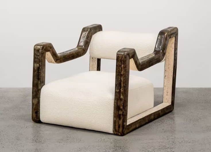 A contemporary armchair featuring a distinct sculptural frame and upholstered seat and back. The fra… — free OBJ 3D model