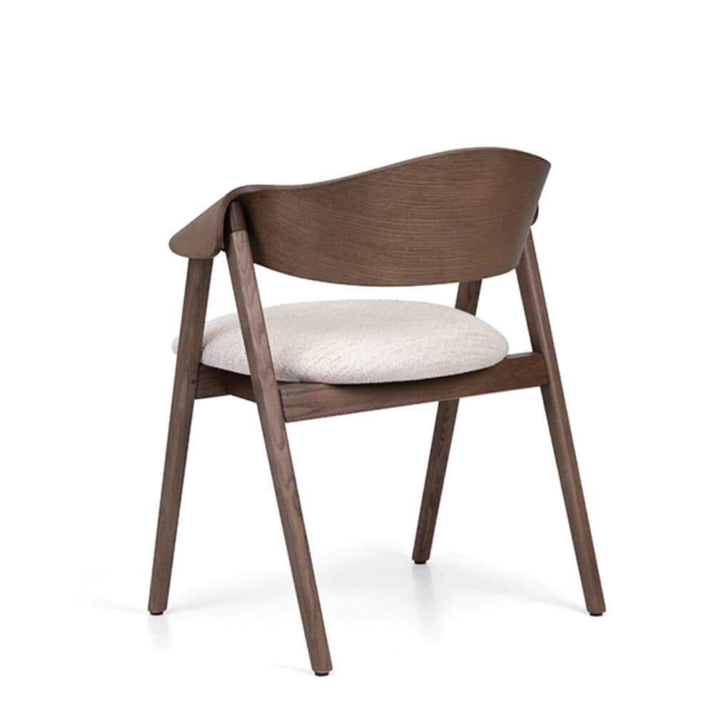 A modern dining armchair featuring a dark brown wooden frame, a distinctively curved and integrated… — 3D model