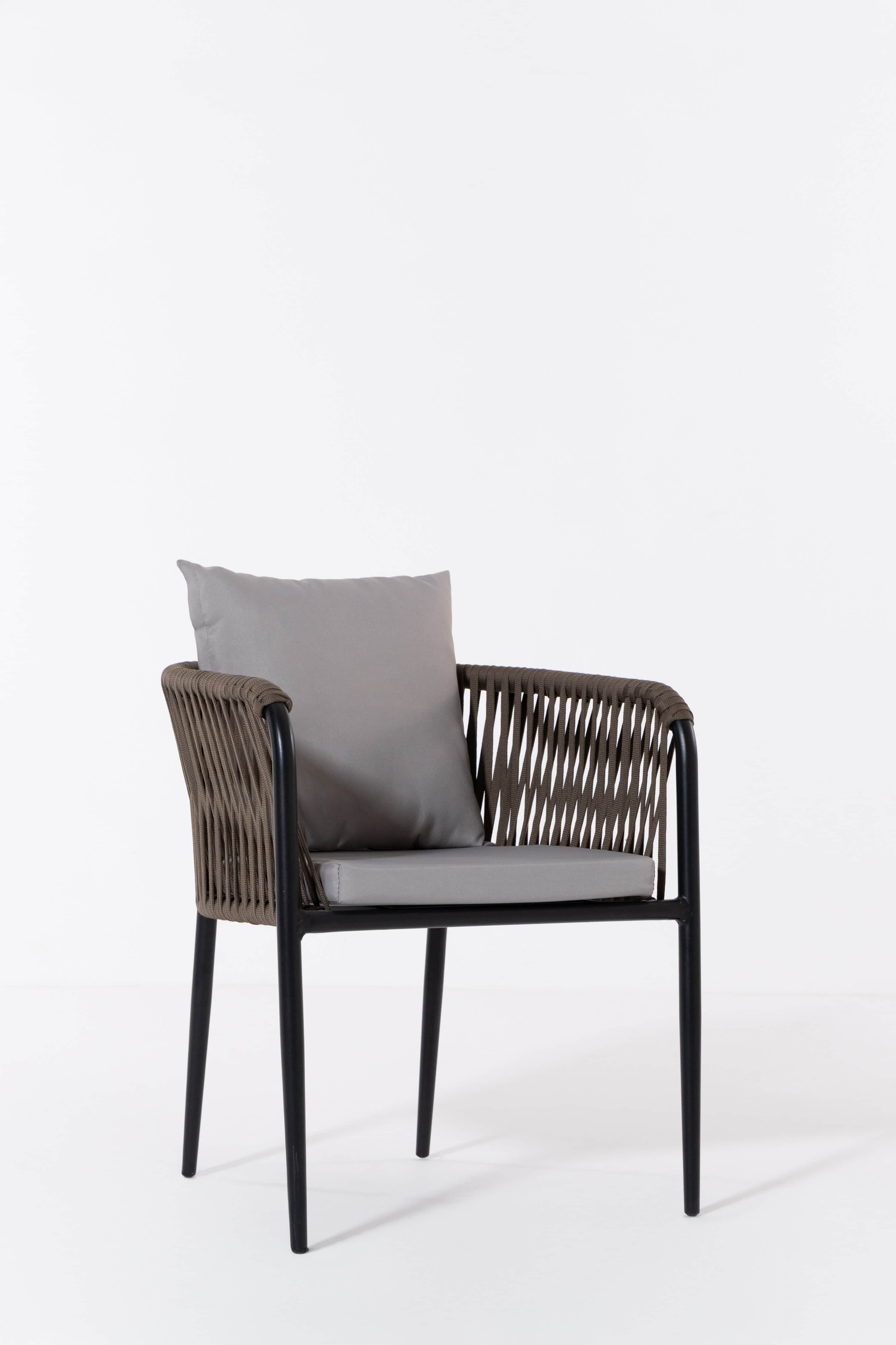 An outdoor armchair featuring a black tubular metal frame, dark brown/taupe woven rope detailing on… — 3D model