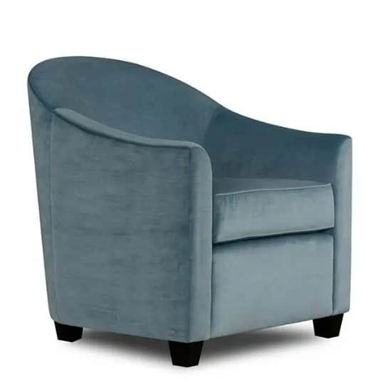 A contemporary upholstered accent chair with a rounded back and integrated arms, featuring a soft ve… — 3D model