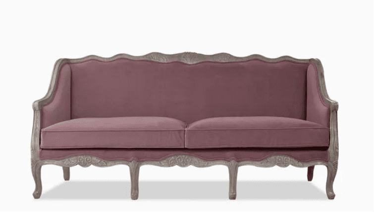 A French Provincial style loveseat featuring a carved wooden frame with a distressed finish and mauv… — 3D model