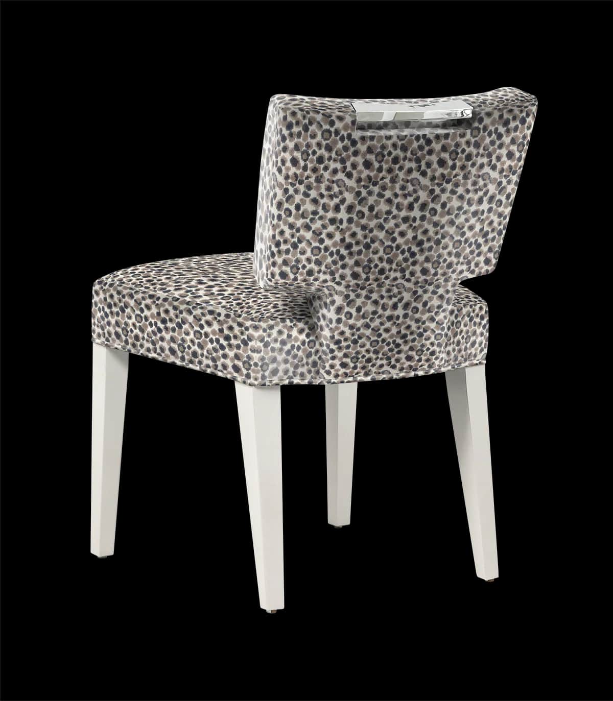 An upholstered accent chair with a unique leopard print fabric on the seat and back. The chair has f… — free GLTF 3D model