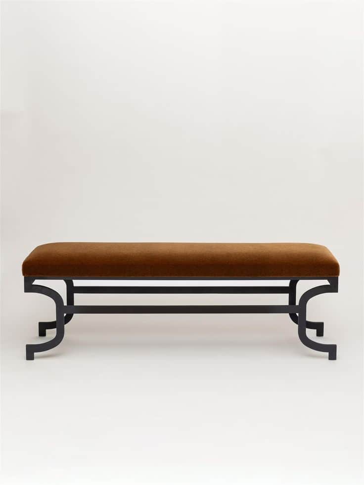 A long, rectangular upholstered bench featuring a plush, dark brown velvet seat and a black powder-c… — 3D model