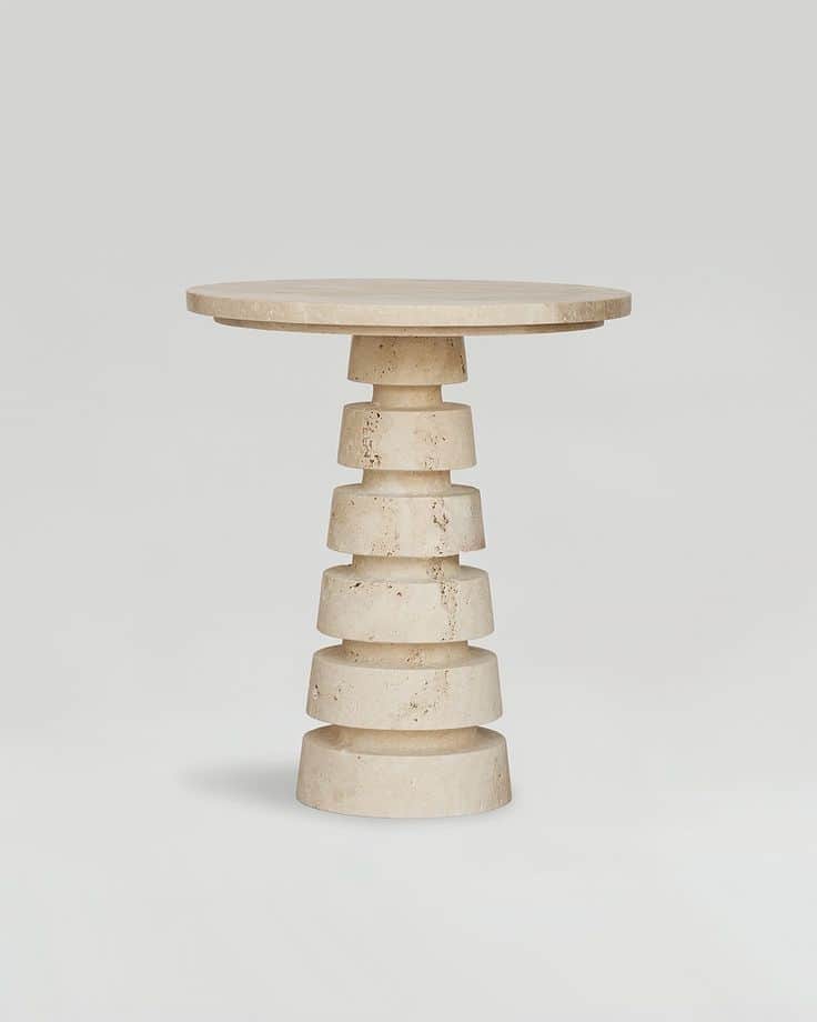 A cylindrical side table with a tiered pedestal base. The tabletop is round and flat. The pedestal i… — 3D model