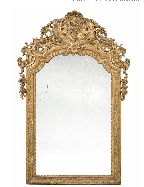 A large, ornate gilded mirror featuring an elaborate Rococo-style frame and crest. The frame is intr… — 3D model