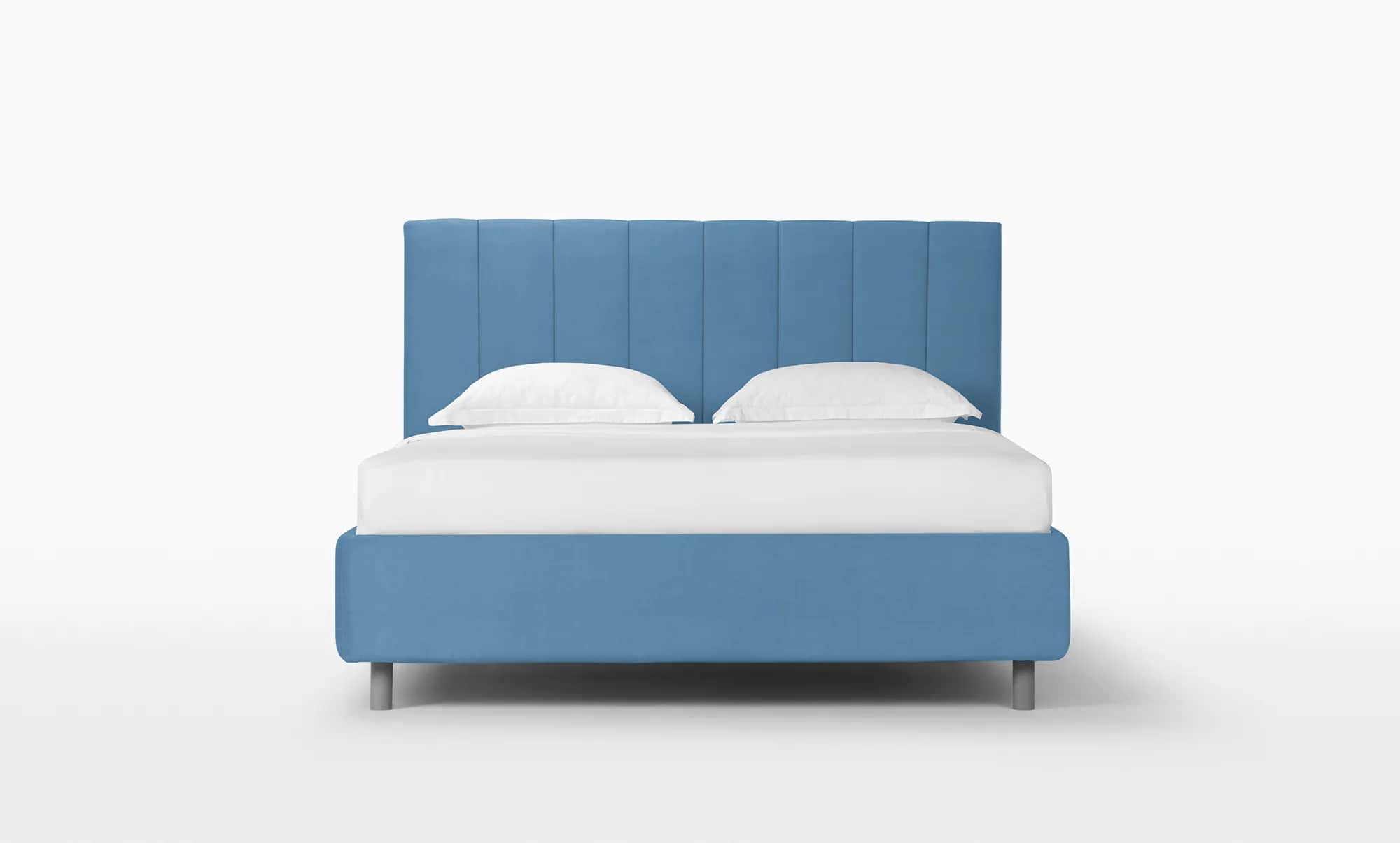 A modern platform bed featuring a tall, upholstered headboard with vertical channel tufting, and a m… — free BLEND 3D model