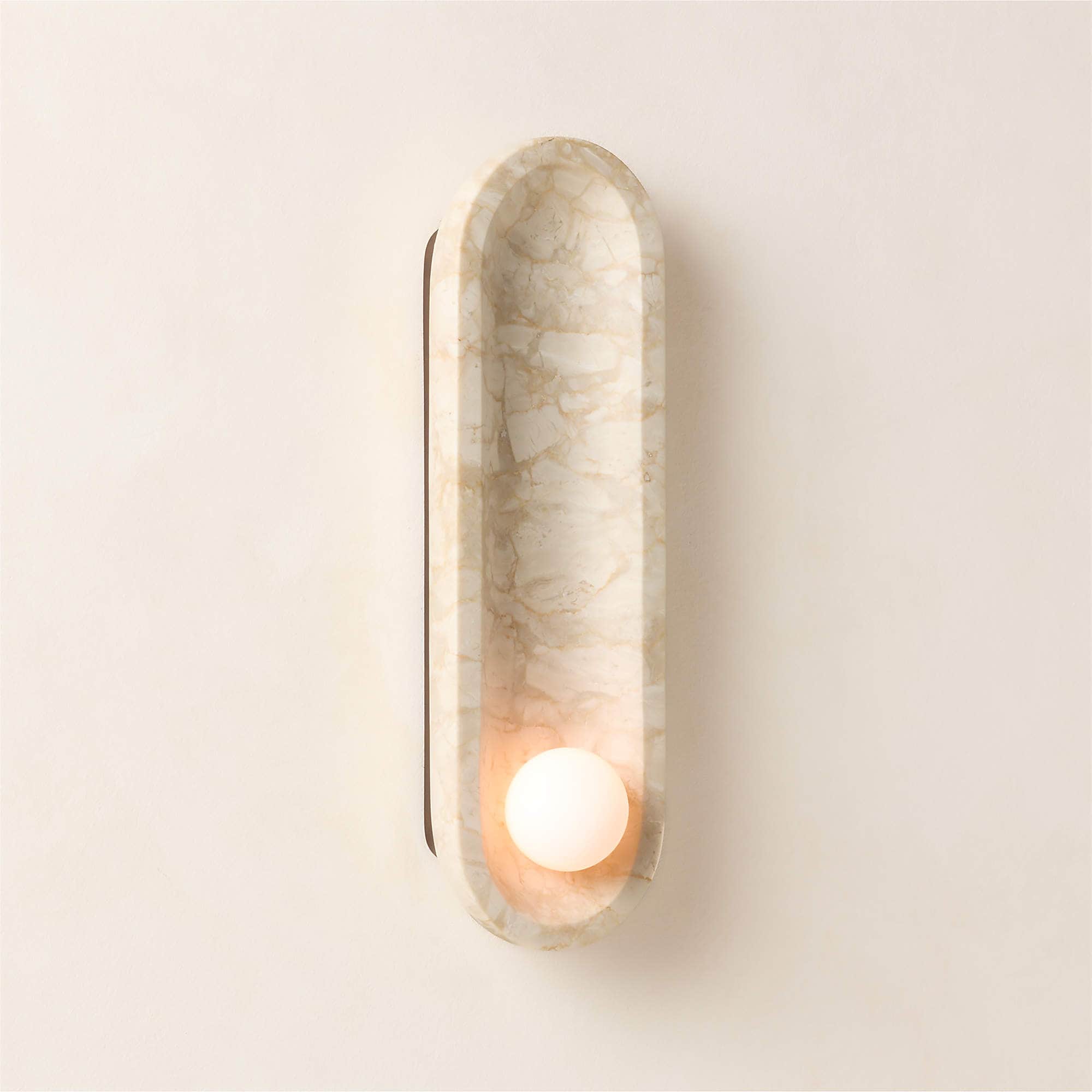 A contemporary wall-mounted light fixture featuring an elongated, pill-shaped body crafted from ligh… — 3D model
