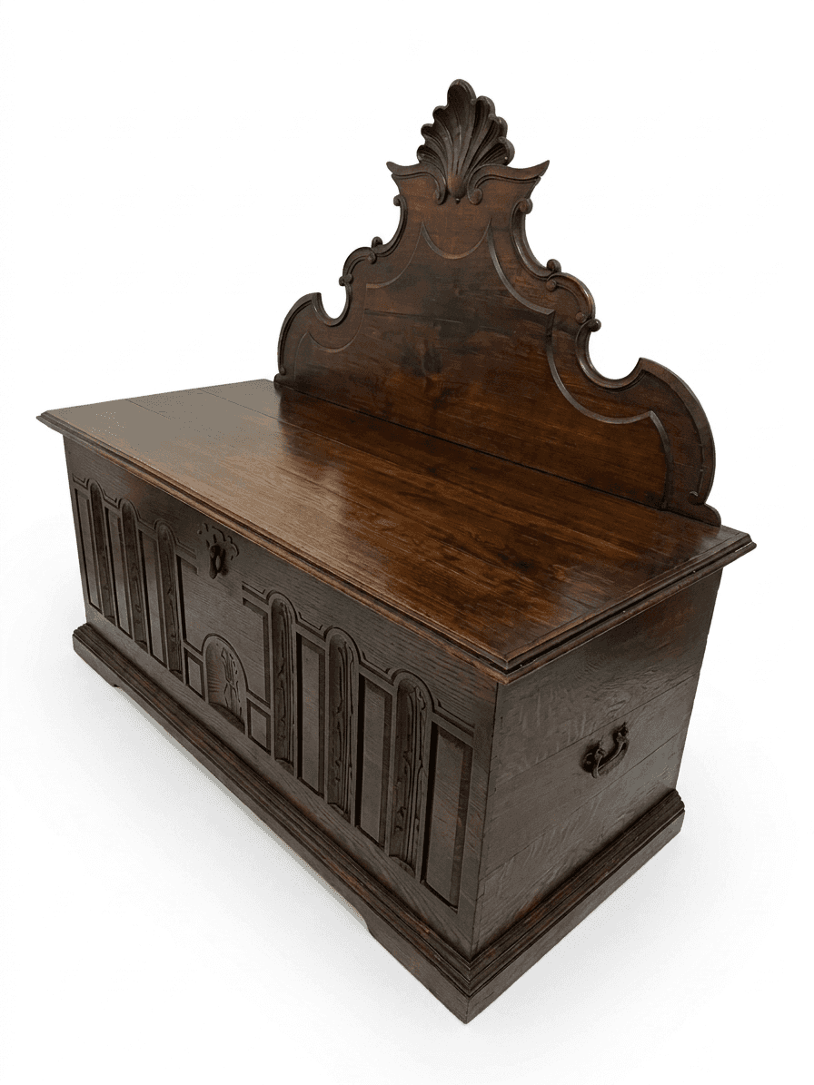 A dark wooden chest with a decorative crest or backplate and carved paneling on the front. The chest… — free OBJ 3D model