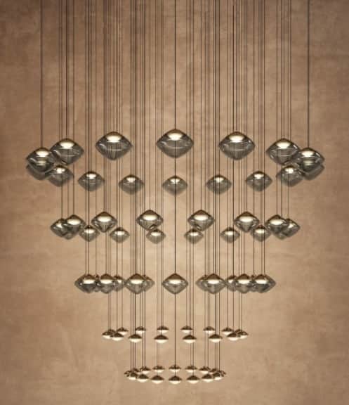 A sophisticated modern chandelier comprising numerous individual pendants arranged in a tiered, casc… — free GLB 3D model