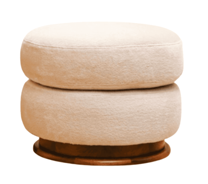 A round, upholstered ottoman featuring a stacked cylindrical design. The upholstery has a textured,… — free OBJ 3D model