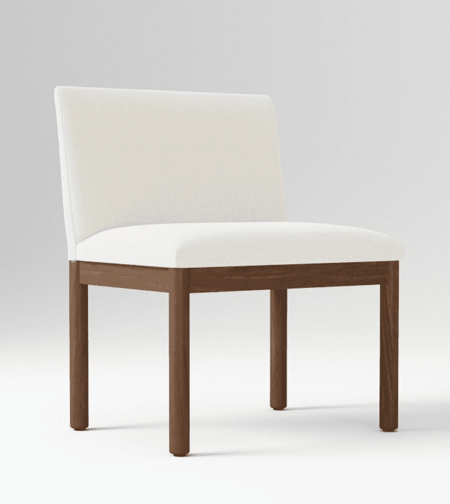 An armless dining chair featuring an upholstered seat and backrest in a light, neutral fabric, suppo… — 3D model