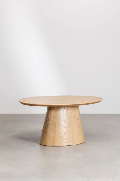 A modern round dining table featuring a light-toned wooden top and a matching conical pedestal base. The table has a minimalist design with clean lines and a smooth finish, showcasing the natural wood grain. — 3D model