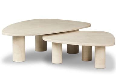 A set of two nesting coffee tables crafted from light-colored travertine, featuring irregular, organically shaped tabletops and sturdy cylindrical legs. — 3D model