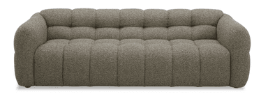 A modern, fully upholstered sofa with a plush, textured fabric. The design features deep channel tufting on both the seat and back cushions, creating a rounded, segmented appearance. The arms and base have a soft, curved profile, giving it a contemporary and inviting look. — 3D model