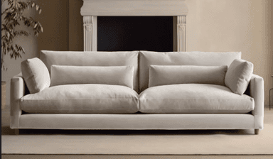 A contemporary three-seater sofa with a minimalist design. It features a clean-lined structure with deep, plush cushions for the seat and back. Two decorative lumbar pillows are placed in front of the back cushions. The sofa is supported by short, tapered wooden legs. — 3D model