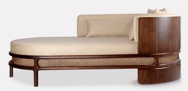 An elegant single-armed chaise lounge featuring a dark walnut wood frame with intricate cane webbing detail and plush upholstered cushions in a neutral beige fabric. — 3D model