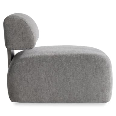 An armless, upholstered lounge chair with a low-profile, blocky silhouette and a hidden swivel base. The chair features a separate backrest cushion that appears to float above the seat. — 3D model