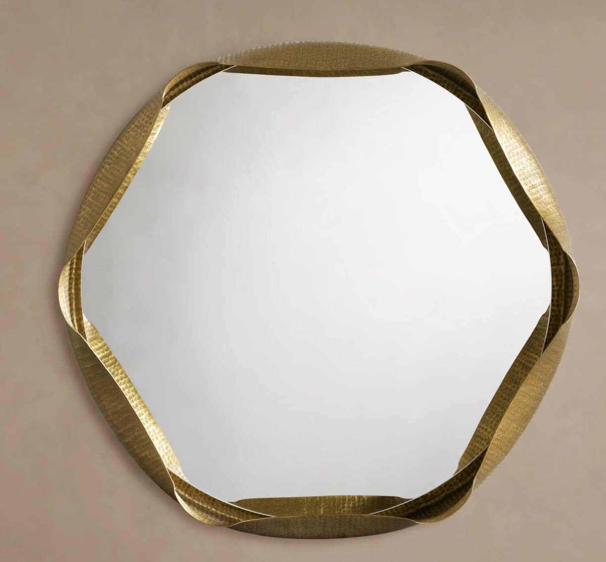 A decorative mirror with an irregular hexagonal shape. The frame is constructed from a textured, metallic material that appears to be brass or a similar gold-toned alloy. The frame has a dynamic, undulating profile, with sections that appear to twist or curve inwards and outwards, creating a sense of movement. The reflective surface is central and is surrounded by this ornate frame. — 3D model