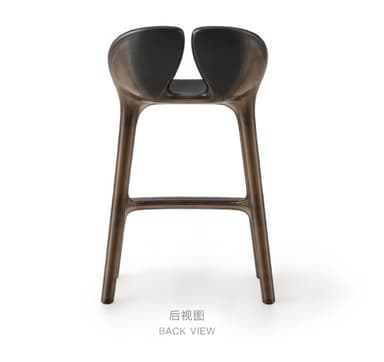 A contemporary bar stool featuring a sculptural form, made from a dark, potentially translucent, molded material. It has a distinctive split backrest and an integrated footrest, with a continuous, flowing design from the seat to the legs. — 3D model