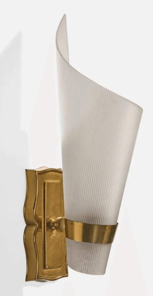 An elegant wall sconce featuring an ornate brass backplate and a curved, fluted glass shade. The shade is held in place by a brass band, and its translucent, ribbed surface is designed to diffuse light. The design combines decorative elements with functional lighting. — 3D model