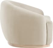 A contemporary armchair with a rounded barrel shape, upholstered in beige velvet-like fabric, and sitting on a curved light wood plinth base. — 3D model