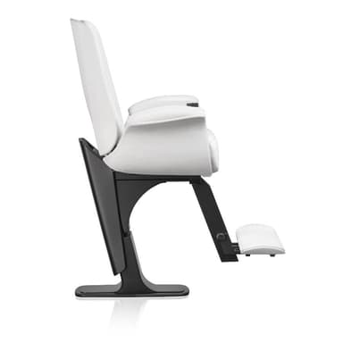 A modern professional barber chair featuring white upholstered seating surfaces, padded armrests, and an integrated footrest, all supported by a robust black pedestal base. — 3D model
