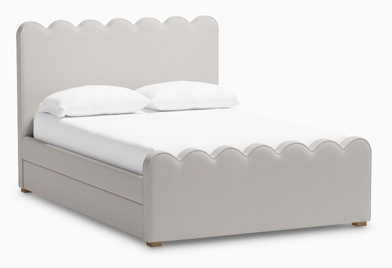 A fully upholstered bed frame with a scalloped headboard and footboard. The bed features a built-in storage drawer system integrated into the base. The frame is supported by short, wooden block feet. — 3D model