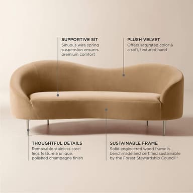 A modern curved back sofa upholstered in plush, champagne-colored velvet, featuring slender, polished stainless steel legs with a champagne finish. — 3D model