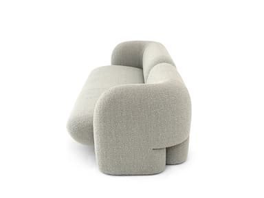 A contemporary sofa characterized by its soft, rounded forms, upholstered in a light, textured boucle fabric, and featuring a single loose back cushion. — 3D model