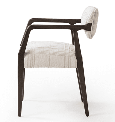 A contemporary upholstered armchair featuring a dark wooden frame and a light plaid fabric. The chair has a separate upholstered backrest and seat, with integrated wooden armrests that flow into the rear legs. The legs are slender and tapered. — 3D model