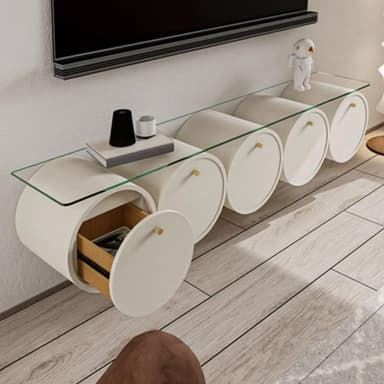 A contemporary console table featuring a clear glass tabletop supported by a series of five horizontal cylindrical storage units. The units are finished in a light, off-white or beige tone, each with a circular door that opens to reveal internal storage, one of which shows a wooden drawer insert. Each door is fitted with a small, round brass-colored knob. — 3D model