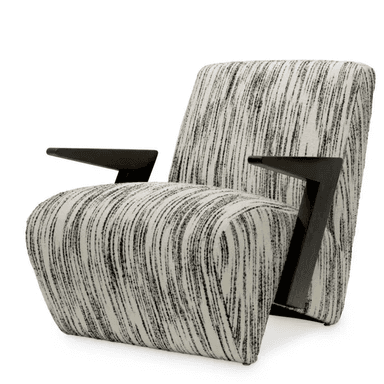 An armchair with a distinctively shaped frame and upholstery. The armchair features a high back and a seat that curves around the sides. The armrests are made of a dark, angular wooden frame that contrasts with the upholstered seat and back. The upholstery is a textured fabric with a pattern of irregular vertical black lines on a cream background. The base of the chair is not fully visible but appears to be integrated with the overall structure. — 3D model