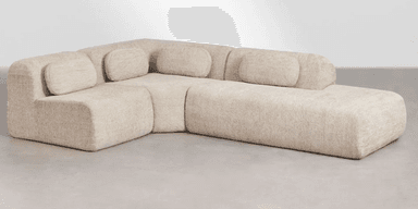 An L-shaped modular sectional sofa in a light beige, textured fabric, featuring soft, rounded edges and separate, integrated back cushions. The design is low-profile and contemporary, emphasizing comfort and an organic aesthetic. — 3D model