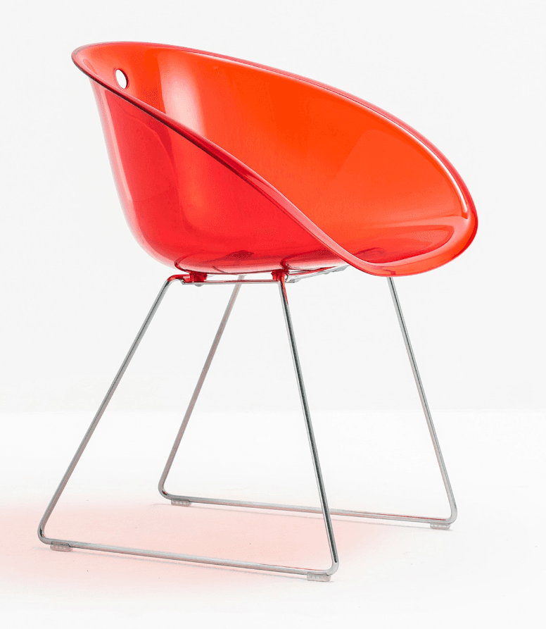 A contemporary chair featuring a single-piece, translucent red plastic shell for the seat and back, supported by a polished chrome-plated metal sled base. — 3D model