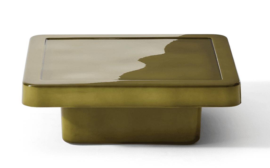 A low-profile square coffee table with a monolithic design, featuring a glossy olive green finish, a recessed top surface, and a solid pedestal base. — 3D model
