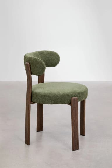 A contemporary chair featuring a dark wood frame and green upholstered seat and back. The backrest is curved and supported by two prominent wooden uprights from the rear legs. — 3D model