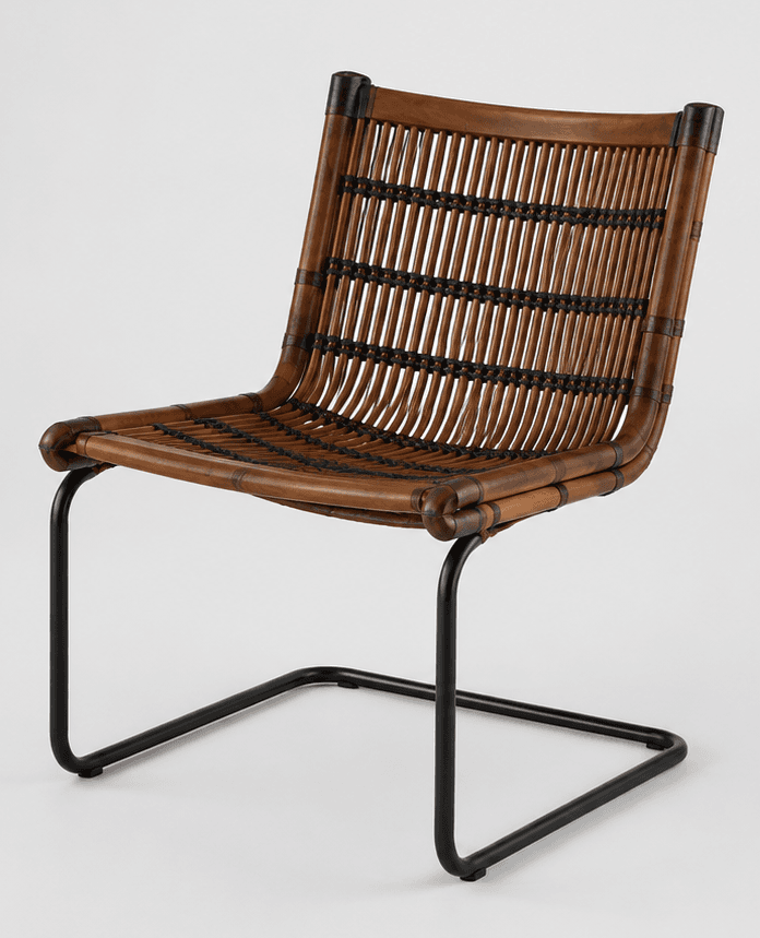 A modern armless chair featuring a woven rattan seat and backrest on a black powder-coated steel cantilever frame. — 3D model