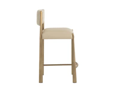 A contemporary bar stool with a metal frame and upholstered seat and backrest. The frame has a warm metallic finish and features tapered legs connected by a footrest. The seat and backrest are padded and covered in a neutral-toned fabric. — 3D model