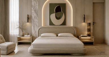 A modern platform bed featuring a fully upholstered frame and headboard. The design emphasizes soft, rounded edges throughout, creating a contemporary and inviting aesthetic. It is presented with a light-colored fabric upholstery and includes a mattress and two pillows, suggesting a minimalist and comfortable sleeping solution. — 3D model