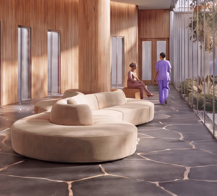 A modular, curved sofa with a rounded, semi-circular overall shape. It is composed of multiple connected sections, forming a continuous seating arrangement. The sofa features low-profile backrests and a cohesive, upholstered design. The central section has a distinctive curved backrest that flows into the main body of the sofa. — 3D model