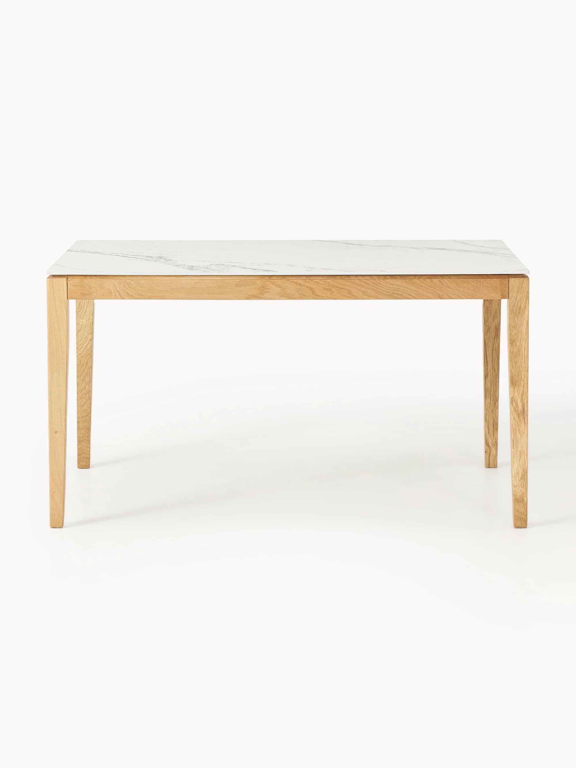 A modern rectangular dining table featuring a white top with grey marble-like veining, supported by four straight, slightly tapered legs made of light-colored solid wood. The design is minimalist and contemporary. — 3D model
