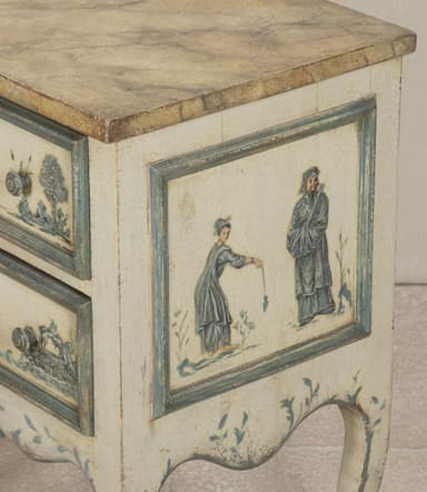 A pair of matching nightstands with two drawers each. The front panels of the drawers and the lower skirt are adorned with hand-painted blue and white scenic details, featuring boats and architectural elements. The nightstands have a distressed cream-colored finish and are supported by four cabriole legs. The top surface appears to be a different material, possibly a veneer or stone. — 3D model